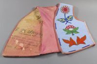 Flathead%20artist%2C%20%3Cb%3E%3Ci%3E%20Child%27s%20Vest%3C%2Fi%3E%3C%2Fb%3E%2C%20ca.%201930%2C%20glass%20beads%20on%20cloth%2C%20The%20Elizabeth%20Cole%20Butler%20Collection%2C%20no%20known%20copyright%20restrictions%2C%202012.67.1